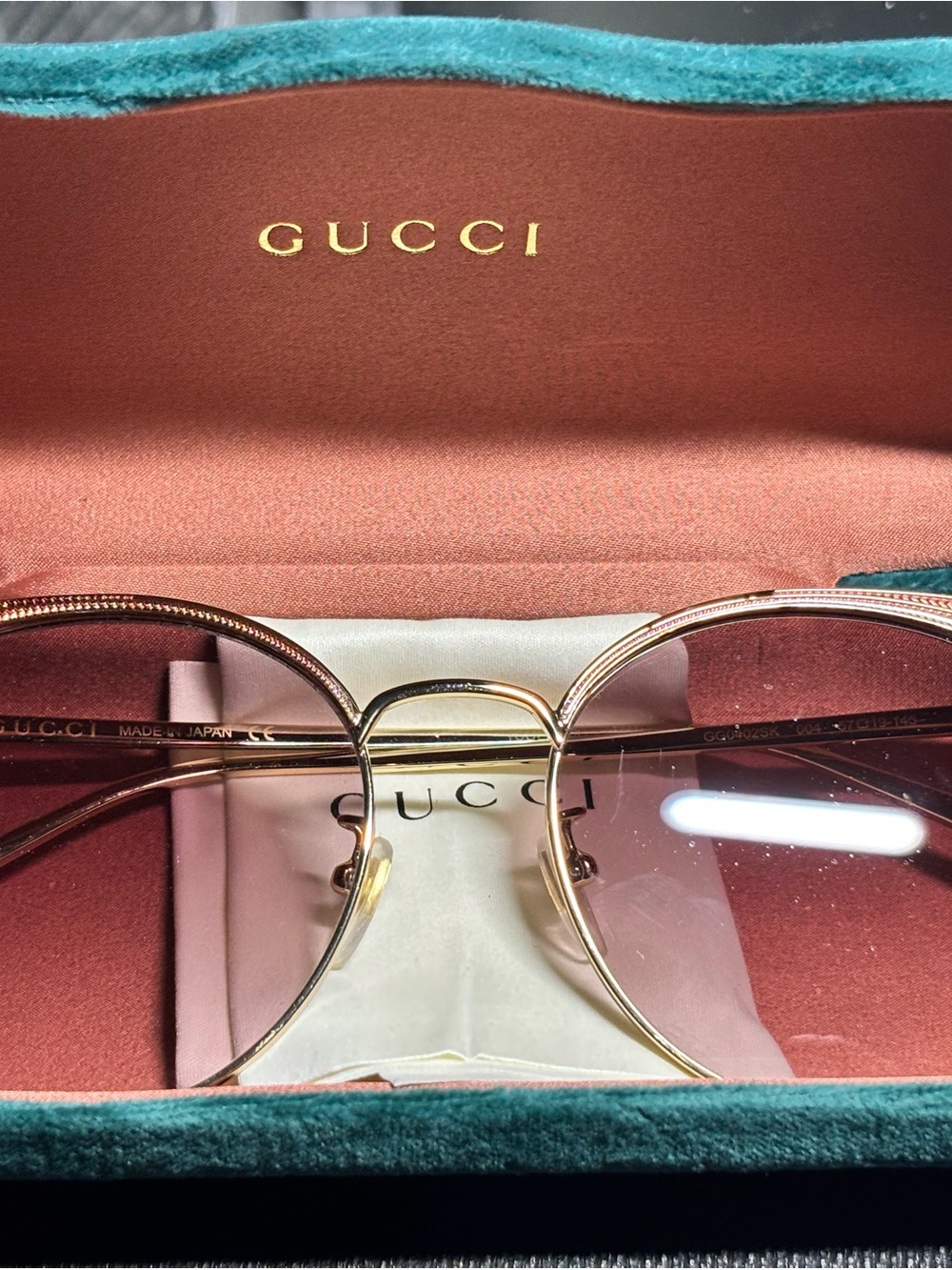 Gucci Gold Frame Pink Lens Round Sunglasses
